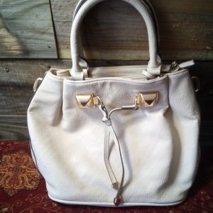 Jessica Simpson cream colored purse